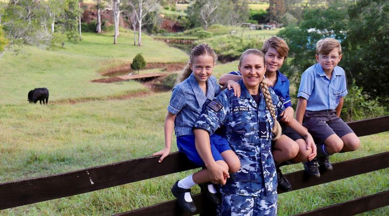 Leading Aircraftwoman Svitlana Pogrebnyak with her three children Christopher, centre, and twins Sophie and Matthew on their family property near RAAF Base Amberley in Queensland. Story by Flight Lieutenant Clarice Hurren.
