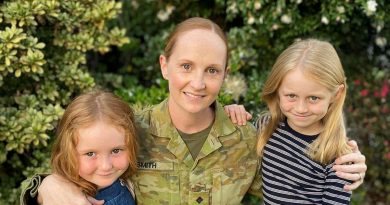 Captain Leigh Smith, a public affairs officer in the Army Reserve, with her daughters. Story by Venetia Reynolds.