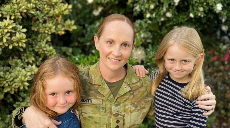 Captain Leigh Smith, a public affairs officer in the Army Reserve, with her daughters. Story by Venetia Reynolds.