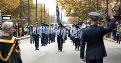 South Australian Police Chief Superintendant Stuart McLean challenges No. 24 (City of Adelaide) Squadron during a march along King William Street to Adelaide Town Hall. Story by Flying Officer Suellen Heath. Photo by Leading Aircraftman Sam Price.