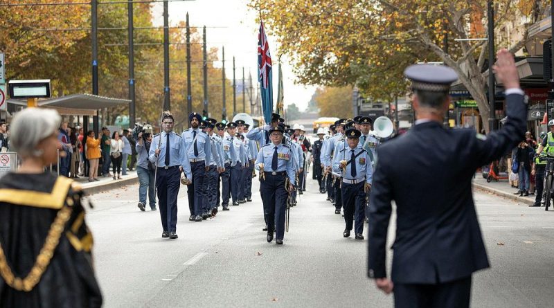 South Australian Police Chief Superintendant Stuart McLean challenges No. 24 (City of Adelaide) Squadron during a march along King William Street to Adelaide Town Hall. Story by Flying Officer Suellen Heath. Photo by Leading Aircraftman Sam Price.