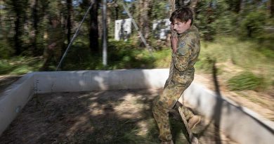 Cadet Warrant Officer Class 2 Hunter Folkes, of Sydney Grammar Army Cadet Unit, swings over the rope pit during the Adventure Training Award at Holsworthy Barracks. Photo by Trooper Jarrod McAneney.