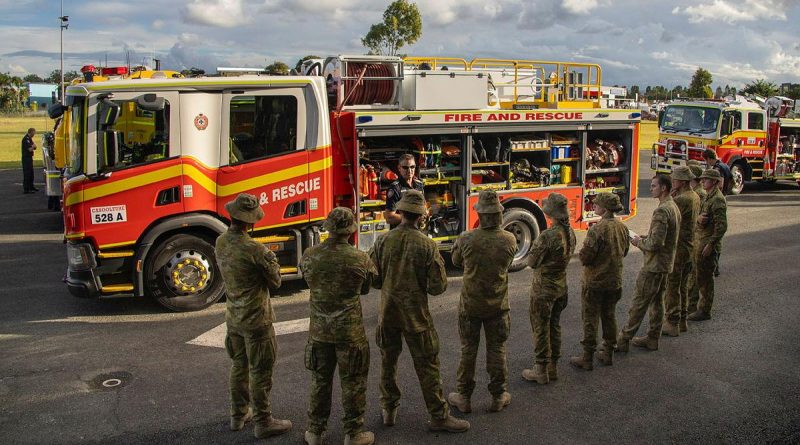 Members of 2/14 Light Horse Regiment (Queensland Mounted Infantry) receive a briefing from the Queensland Fire and Emergency Services during Exercise Incendium on the Sunshine Coast. Story by Captain Jesse Robilliard. Photo by Sergeant Brendan Davis.