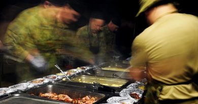 Australian Army chefs and stewards prepare 'hot-box' meals in a field kitchen at Shoalwater Bay, Queensland, during Exercise Talisman Saber 2013. Photo by Corporal Jake Sims.