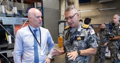 Director of Mission Systems PTY David Battle discusses with Captain Etienne Mulder from the Mine Warfare and Clearance Diving Group about the use of a generator used to jam mine firing systems. Story by Lieutenant Commander Alan Parton.