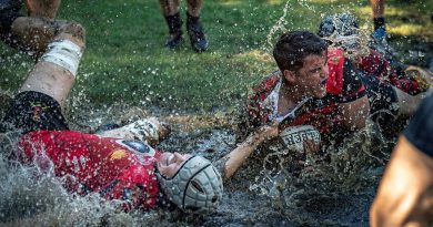 Players from 17 Sustainment Brigade and Combined Arms Training Centre rush to the try line during the Australian Army Inter-Brigade Rugby Competition in Brisbane. Story by Captain Taylor Lynch. Photo by Private Jacob Hilton.