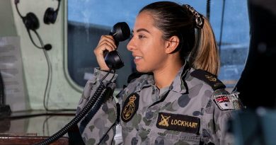 Leading Seaman Lodia Lockhart communicates in Bahasa Indonesia to the Indonesian frigate KRI Diponegoro. Story by Lieutenant Geoff Long. Photo by Leading Seaman Thomas Sawtell.