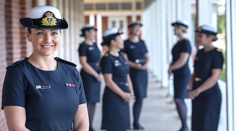 Midshipman Laura Kelly and classmates from the inaugural Maritime Human Recourse Officers Course showcase the Royal Australian Navy's new winter black dress at HMAS Cerberus in Victoria. Photo by Petty Officer James Whittle.