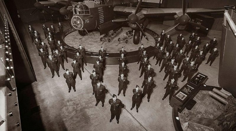 No. 460 Squadron aviators pose in front of the G for George Lancaster bomber at the Australian War Memorial. Story by Flight Lieutenant Jessica Aldred. Photo by Sergeant Oliver Carter.