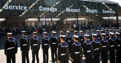 Members of General Entry 388 Emms Division standing at ease during their graduation parade at the Navy Recruit School at HMAS Cerberus, Victoria, with family and friends in the background. Story by Lieutenant Ben Willee. Photo by Leading Seaman Bonny Gassner.