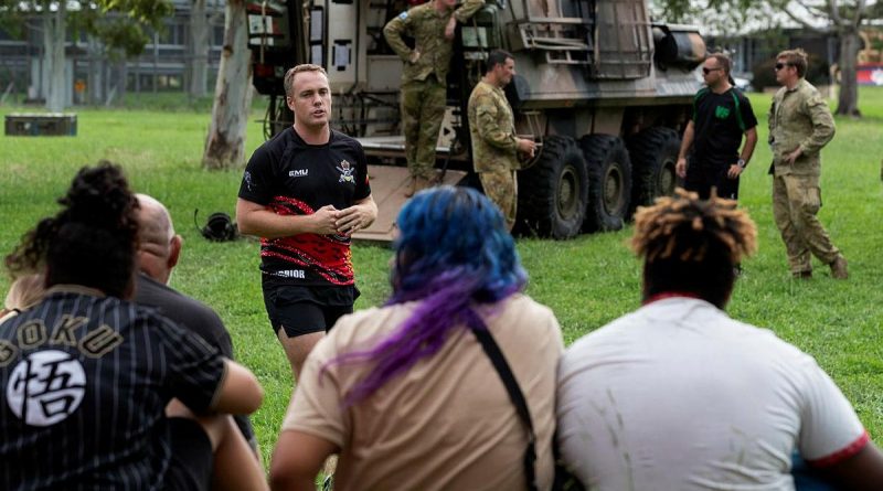Major Matthew Daniell, from the 2nd Cavalry Regiment, briefs participants of the Proud Warrior youth engagement program at Lavarack Barracks. Story by Captain Lily Charles. Photo by Corporal Brandon Grey.