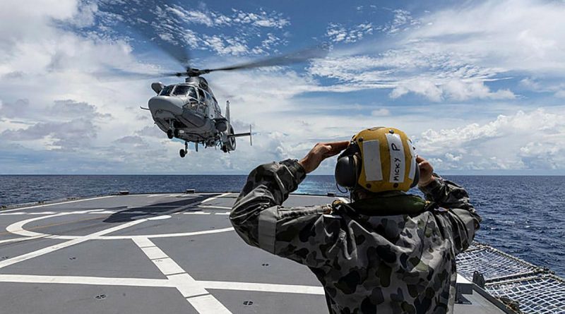 A French Navy helicopter from FS Tonnerre approaches HMAS Parramatta as the two ships sail together in the South China Sea. Story and photo by Leading Seaman Jarrod Mulvihill.