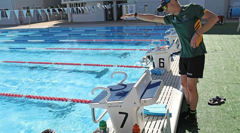 Invictus Games competitor Trent Forbes receives training from Team Australia - Assistant swim coach Andrew Wilkinson at the Gold Coast Performance Centre. Photo by Leading Seaman Jayson Tufrey.