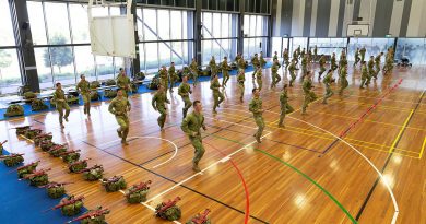 An Australian Army physical training instructor takes candidates through a warm-up before starting the Special Forces Entry Test at Holsworthy Barracks, Sydney, on Monday, 01 March 2021. Story by Lieutenant Anthony Martin. Photo by Leading Aircraftwomwan Jacquelline Forrester.