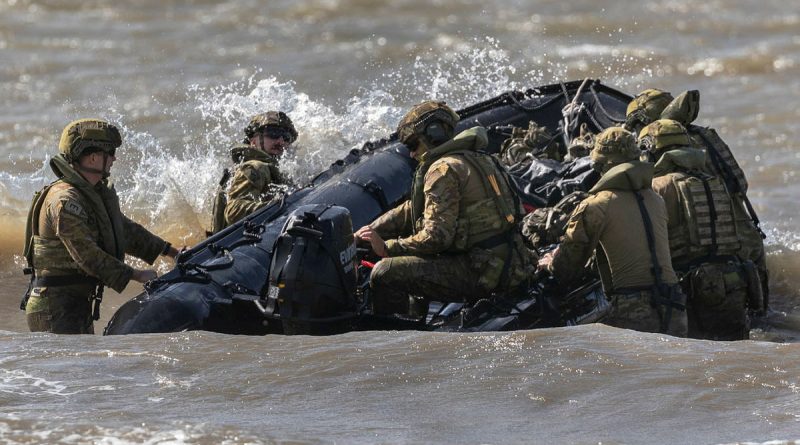 Australian Army soldiers from the 3rd Combat Engineer Regiment deploy a Zodiac rigid inflatable boat during Exercise Thunder Strike in Townsville, Queensland on 20 May 2021. Story by Captain Diana Jennings. Photo by Corporal Sagi Biderman.
