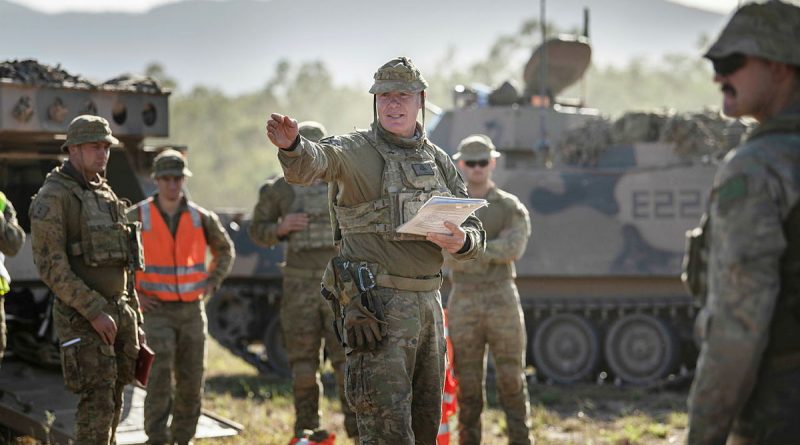 Australian Army Warrant Officer Class Two Matt Watt (centre) from the 2nd/14th Light Horse Regiment, (Queensland Mounted Infantry) gives a safety brief before a live-fire offensive operation serial featuring soldiers from the 6th Battalion Royal Australian Regiment and the 2nd Combat Engineer Regiment during Exercise Diamond Walk at Shoalwater Bay, Queensland. Story by Captain Jesse Robilliard. Photo by Private Jacob Hilton.