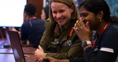 Head Information Warfare Major General Susan Coyle, CSC, DSM (left) meets with Australian Defence Force Cyber Gap Program participant Shobita during a "capture the flag" cyber skills challenge. Story by Corporal Julia Whitwell.