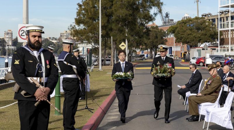 Commander Australian Fleet Rear Admiral Mark Hammond and Consul-General of Japan Kiya Masahiko prepare to lay wreaths during the memorial service at HMAS Kuttabul. Story by Lieutenant Brendan Trembath. Photo by LSIS Leo Baumgartner.