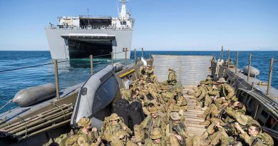 Soldiers from the 2nd Battalion, Royal Australian Regiment, on board an Australian Army LCM-8 landing craft depart HMAS Canberra for beach landing serials during Exercise Sea Explorer. Story by Captain Dan Mazurek. Photo by Leading Aircraftwoman Jacqueline Forrester.