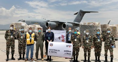 Australian Ambassador to Nepal, Her Excellency Felicity Volk and Lieutenant General Prabhu Ram Sharma Chief of General Staff stand with guests during Australia's handover of humanitarian aid stores to the Nepali Army at Tribhuvan International Airport in Nepal. Story by Leading Seaman Craig Walton. Photo by Corporal Robert Whitmore.