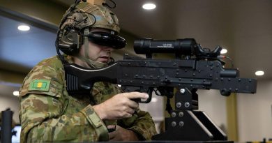 Private Shaun Causer, of the 5th Battalion, Royal Australian Regiment, operates a simulated MAG 58 machine gun as part of convoy simulation training with the Protected Mobility Tactical Trainer at Robertson Barracks. Story by Captain Peter March. Photo by Corporal Rodrigo Villablanca.