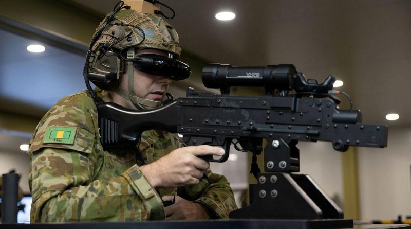 Private Shaun Causer, of the 5th Battalion, Royal Australian Regiment, operates a simulated MAG 58 machine gun as part of convoy simulation training with the Protected Mobility Tactical Trainer at Robertson Barracks. Story by Captain Peter March. Photo by Corporal Rodrigo Villablanca.