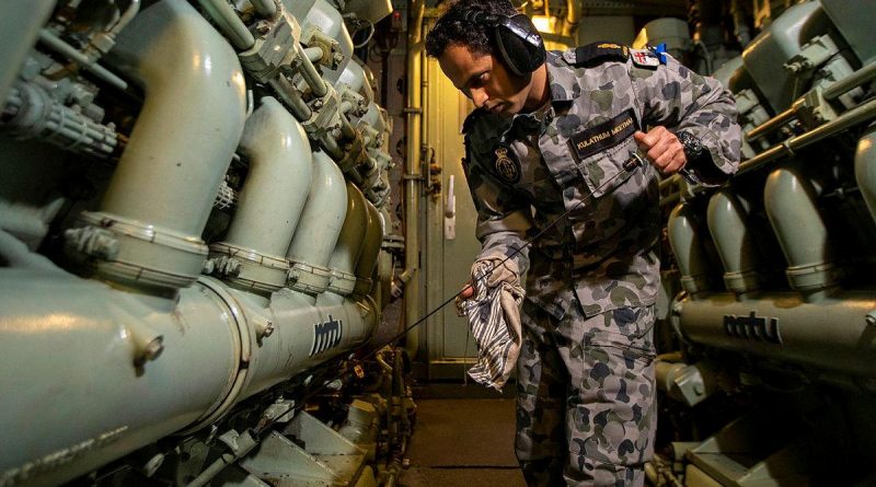 Able Seaman Avin Kulathum Meethal checks engine oil levels in the machinery space on board HMAS Ballarat during a Regional Presence Deployment. Story by Lieutenant Gary McHugh. Photo by Leading Seaman Ernesto Sanchez.