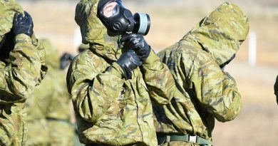 An Army recruit fits his chemical, biological, radiological and nuclear defence (CBRND) suit during Army’s first CBRND basic course using the latest versions of the equipment.