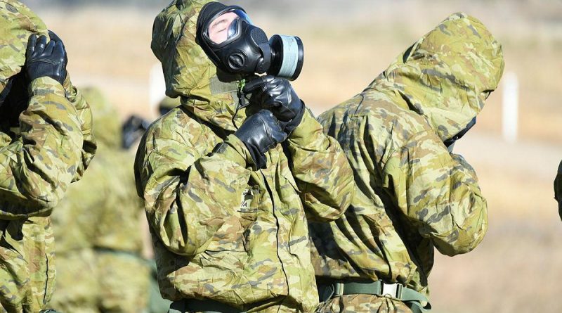 An Army recruit fits his chemical, biological, radiological and nuclear defence (CBRND) suit during Army’s first CBRND basic course using the latest versions of the equipment.