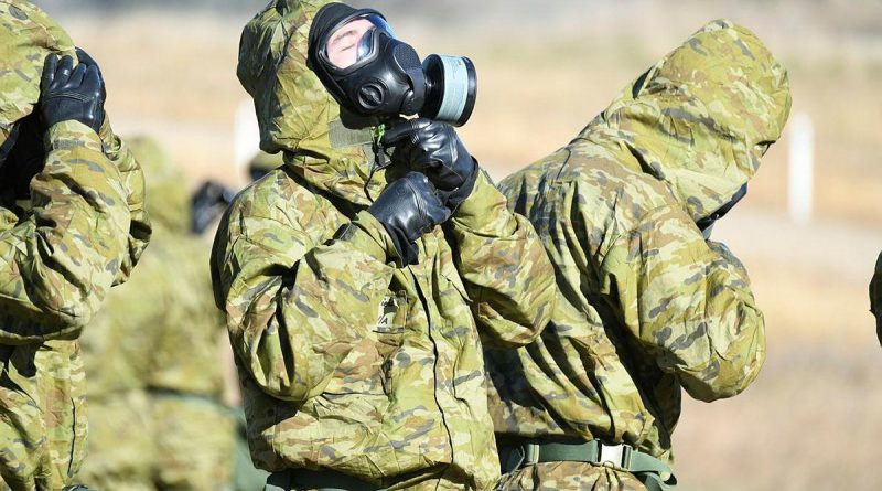 An Army recruit fits his chemical, biological, radiological and nuclear defence (CBRND) suit during Army’s first CBRND basic course using the latest versions of the equipment.