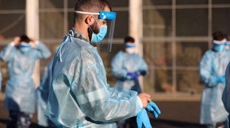 Seaman Jack Foulstone practices correct application of Personal Protective Equipment (PPE) in preparation for their deployment on Operation COVID-19 Assist. Story and photo: Captain Kristen Daisy Clelend