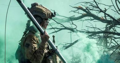 Sapper Chloe Leifels, of the 2nd Combat Engineer Regiment, moves to place a Bangalore torpedo explosive charge onto an obstacle during Exercise Diamond Walk. Story by Captain Jesse Robilliard. Photo by Sergeant Karl Booth.