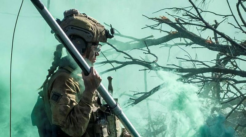 Sapper Chloe Leifels, of the 2nd Combat Engineer Regiment, moves to place a Bangalore torpedo explosive charge onto an obstacle during Exercise Diamond Walk. Story by Captain Jesse Robilliard. Photo by Sergeant Karl Booth.