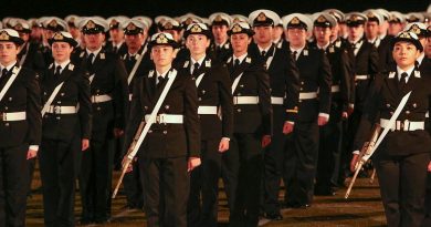 Graduates of the New Entry Officers Course 64 parade stand at attention during a ceremonial sunset on the evening before their graduation at HMAS Creswell, Jervis Bay. Story by Lieutenant Sarah Rohweder. Photo by Able Seaman Leon Dafonte Fernandez.
