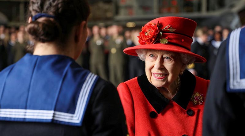 Queen Elizabeth talks with members of the ships company of the Royal Navy aircraft carrier HMS Queen Elizabeth in Portsmouth on 22 May 2021, just hours before the UK Carrier Strike Group sailed for its first operational deployment. UK MoD Crown copyright. Photo by Petty Officer Jay Allen.