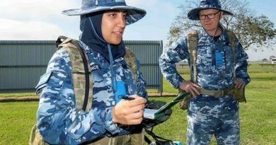 Flying Officer Ayah Khalid, left, with Leadership Reaction Course team member Flying Officer Clayton Wilson during a course at Officer Training School at RAAF Base East Sale. Story by Flight Lieutenant Julia Ravell. Photo by Flight Sergeant Scott Robbins.