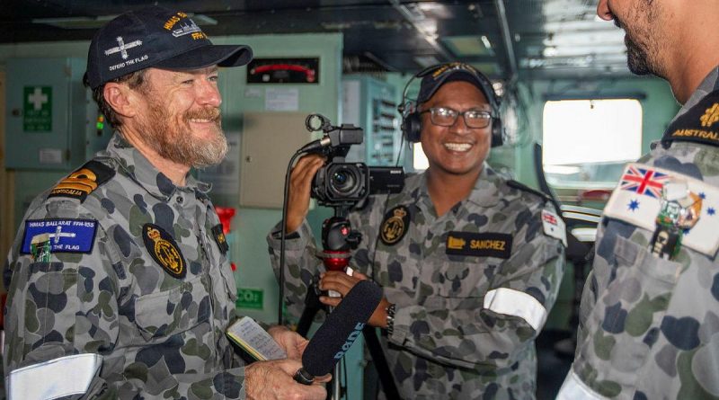 Lieutenant Gary McHugh and Leading Seaman Ernesto Sanchez interview Able Seaman Matthew Hicks on the ship's bridge during a Regional Presence Deployment. Story by Lieutenant Gary McHugh. Photo by Leading Seaman Ernesto Sanchez.