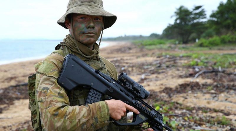 Australian Army soldier and cargo specialist Private Harry Ramsay stands at Cowley Beach, Queensland, during Exercise Sea Explorer. Story and photo by Warrant Officer Class 2 Max Bree.