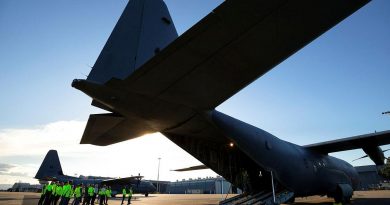 Quickstep Aerospace Services employees are given a tour of a No. 37 Squadron C-130J Hercules during a visit to RAAF Base Richmond. Story by Eamon Hamilton. Photo by Corporal David Said.