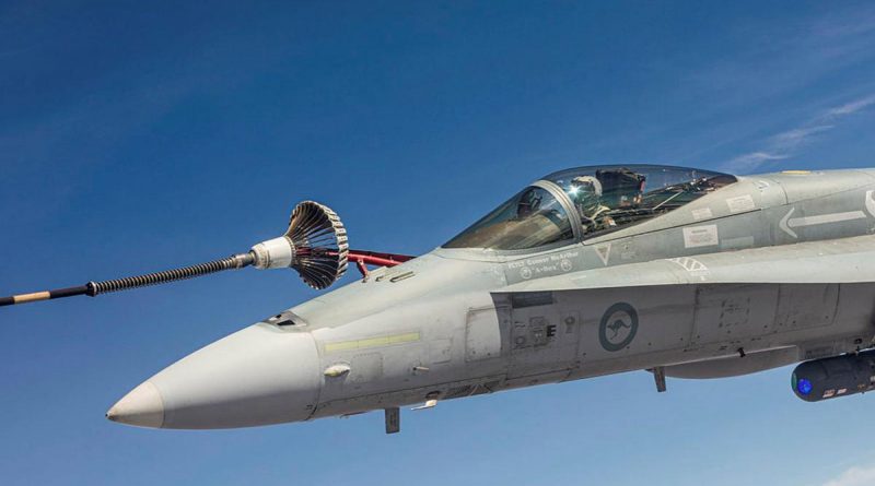 F/A-18A Hornet A21-008 refuels in the air over the Northern Territory during Exercise Arnhem Thunder. Story by Flight Lieutenant Robert Cochran. Photo by Leading Aircraftman Stewart Gould.