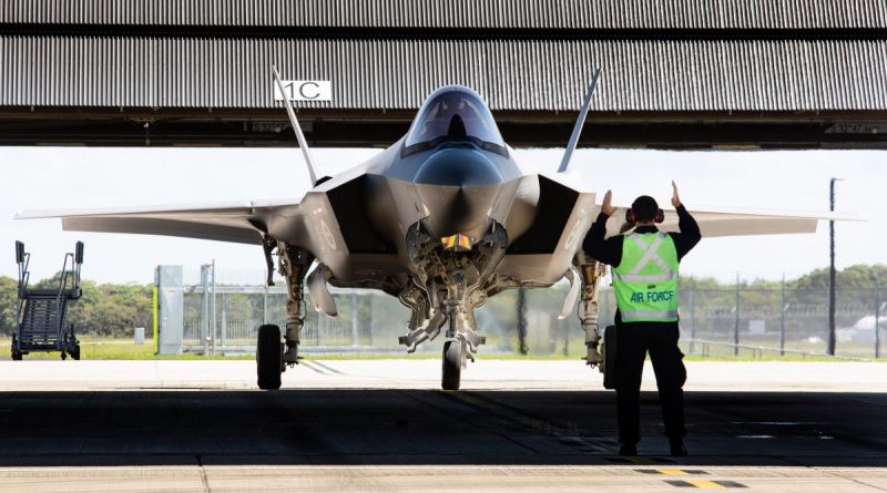 A pilot is marshalled in after completing his first flight in an F-35A Lightning II during the Operational Conversion course at RAAF Base Williamtown. Photo by Sergeant Guy Young.