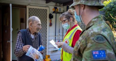 Mount Dandenong resident Jim Henderson has a welfare check by Australian Red Cross representative Kerry Macfarlane and Corporal Paul Summerbell after the recent storm. Story by Captain Martin Hadley. Photo by Corporal David Cotton.