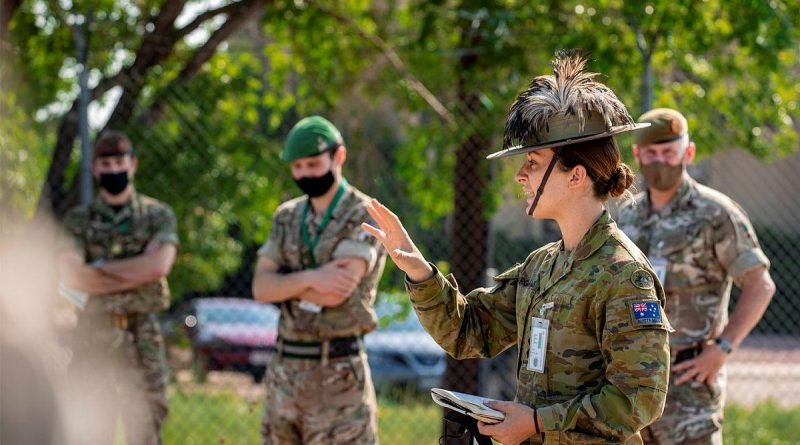 Captain Charlotte Hargreaves, of the 7th Combat Brigade, gives orders to members from the Australian Army, US Army and Canadian Armed Forces during the Joint Warfighting Assessment 2021 at Fort Carson, Colorado. Story by Captain Taylor Lynch. Photo: Corporal Nicole Dorrett.