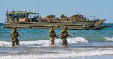 Australian Army soldiers, of 2nd Batallion, the Royal Australian Regiment, approach Langham Beach, Queensland, during Talisman Sabre 2019. Story by Major Cameron Jamieson. Photo by Sergeant 1st Class Whitney C. Houston.