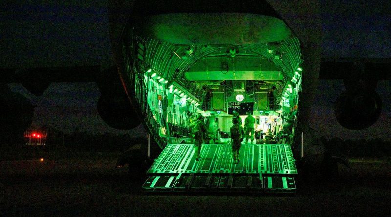 An Air Force aircraft security operations team on the ramp of a C-17A Globemaster III at RAAF Base Amberley during Exercise Precision Gauntlet. Story by Flight Lieutenant Suellen Heath. Photo by Corporal Brett Sherriff.