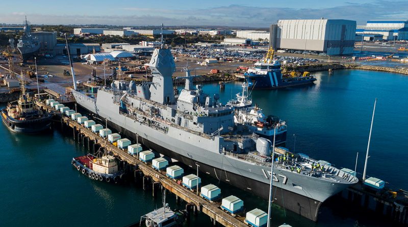 HMAS Perth is lowered out of the dry dock at the Australian Marine Complex at Henderson, WA, after completion of a major part of the Anzac Midlife Capability Assurance Program upgrades. Story by Harriet Pointon Mather.