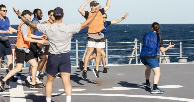 Seaman Boatswain’s Mate Melita Tennant prepares to throw the ball during a Bin Ball competition held on-board HMAS Brisbane, off the coast of Queensland for Exercise Talisman Sabre 2021. Story by Lieutenant Sarah Rohweder. Photo by Leading Seaman Daniel Goodman.