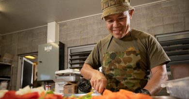 Private Supachai Kladpin, of the 10th Force Support Battalion, cooks meals in the Camp Growl kitchen in the Shoalwater Bay Training Area, Queensland, during Exercise Talisman Sabre. Story by Lieutenant Max Logan. Photo by Corporal Madhur Chitnis.