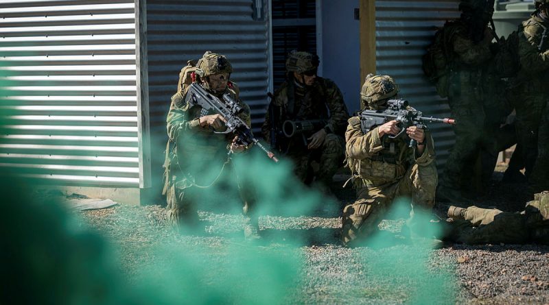 Australian Army soldiers from Battlegroup Eagle conduct a clearance of an enemy camp, at Townsville Field Training Area, Queensland, during Exercise Talisman Sabre 2021. Story by Captain Diana Jennings. Photo by Corporal Brandon Grey.