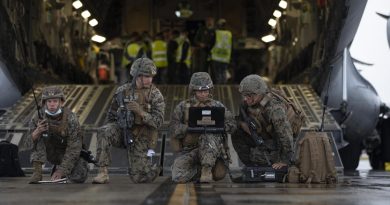 United States Marines conduct a simulated wartime airfield scenario at the rear of a Royal Australian Air Force No. 36 Squadron C-17A Globemaster III aircraft at RAAF Base Amberley, QLD, during Exercise Talisman Sabre 2021. Story by Flight Lieutenant Clarice Hurren. Photo by Corporal Jesse Kane.